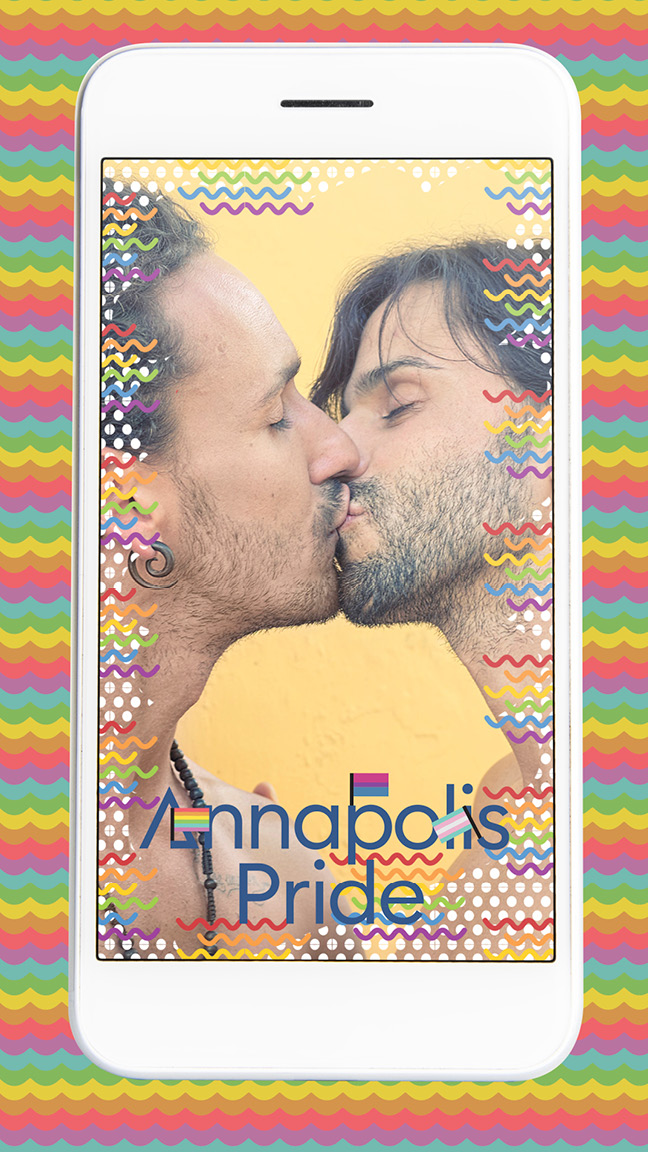 A phone, featuring an image filter of the gay pride flag overlaid on top of an image of two men kissing.